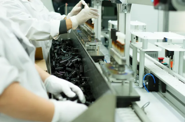 Anomatic associates assembling cosmetic components on an automated line